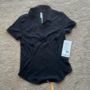 Lululemon Quick-Drying Short Sleeve Polo Shirt in black.